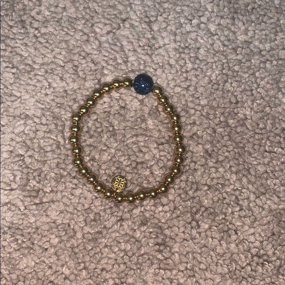 Rustic Cuff Gold bead with sapphire bead.